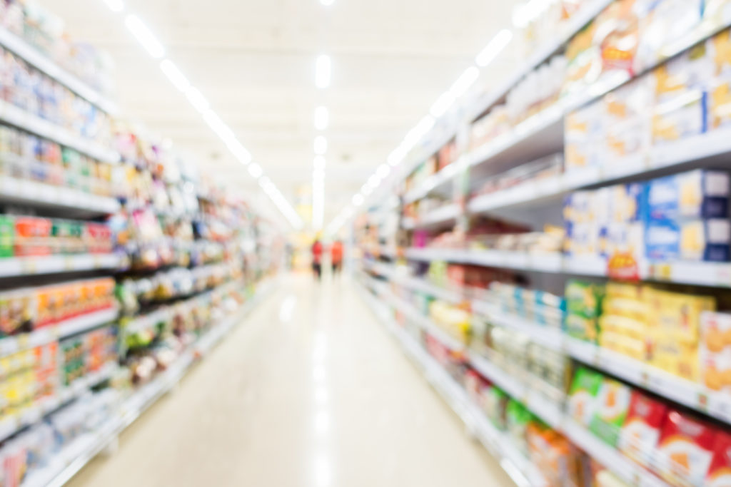Blurred image of a supermarket aisle - products not distinguishable